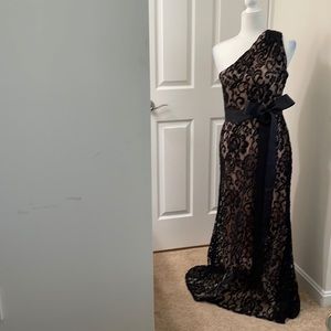 Black lace evening gown with nude under slip